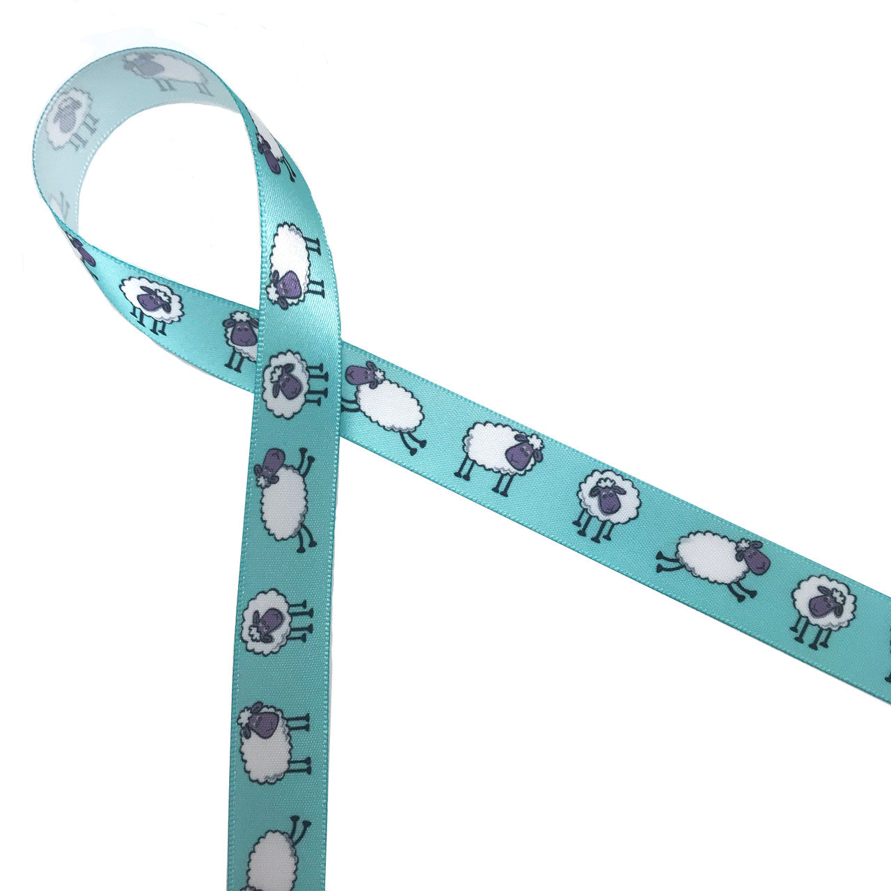 Sheep Ribbon in black and white on a teal blue background printed on 5/8" white single face satin