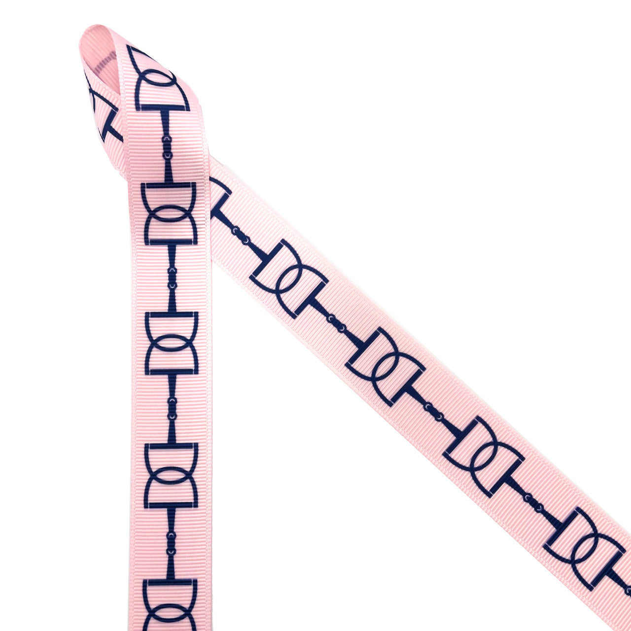 Snaffle bit ribbon with navy blue bits printed on 7/8" pink single grosgrain